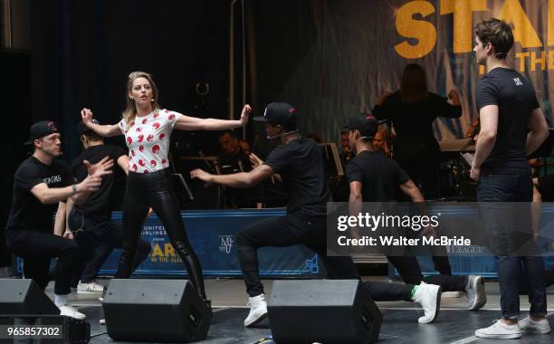 Kyle Selig and Taylor Louderman with the ÔMean GirlsÕ cast performing at the United Airlines Presents: #StarsInTheAlley Produced By The Broadway...