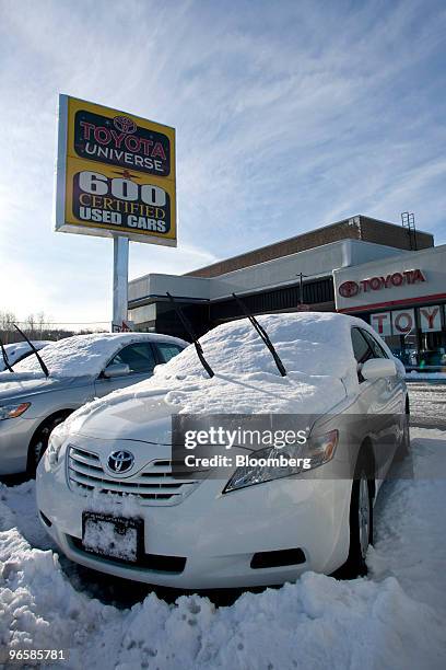 Toyota Camry sedan is covered in snow on the dealership lot of Toyota Universe in Little Falls, New Jersey, U.S., on Thursday, Feb. 2010. Toyota...