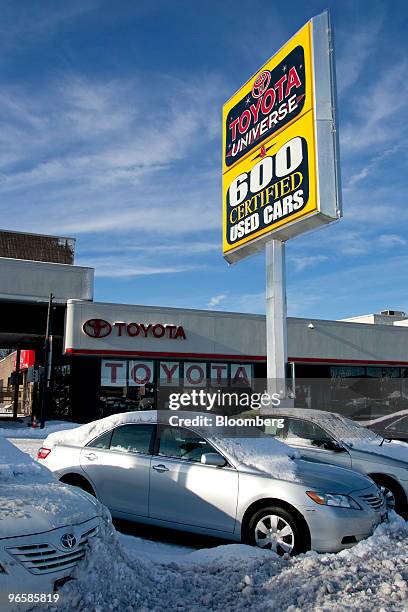 Toyota Camry sedans are covered in snow on the dealership lot of Toyota Universe in Little Falls, New Jersey, U.S., on Thursday, Feb. 2010. Toyota...