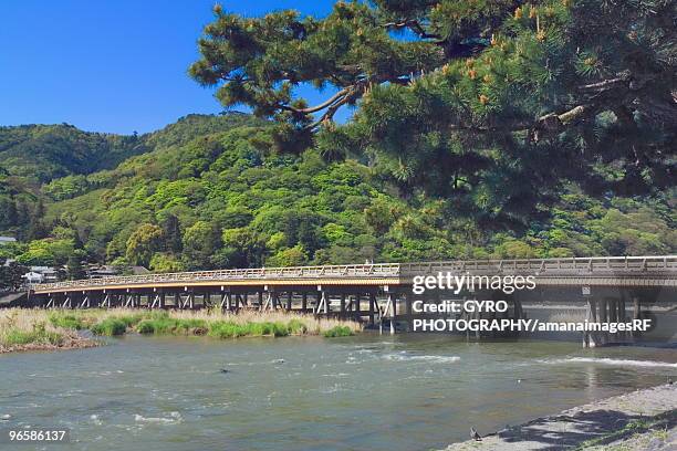mt. arashiyama and togetsu bridge, kyoto prefecture, japan - 渡月橋 ストックフォトと画像