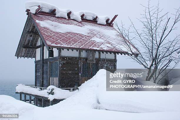 snow covered hut in tazawako,  senboku,  akita prefecture,  japan - tazawa stock pictures, royalty-free photos & images