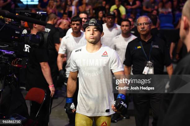 Marlon Moraes of Brazil walks out into the arena prior to facing Jimmie Rivera in their bantamweight fight during the UFC Fight Night event at the...