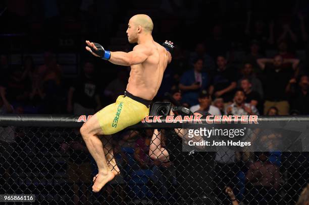 Marlon Moraes of Brazil celebrates after defeating Jimmie Rivera in their bantamweight fight during the UFC Fight Night event at the Adirondack Bank...