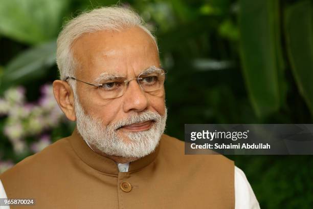 Indian Prime Minister Narendra Modi attends the orchid naming ceremony at the National Orchid Gardens on June 2, 2018 in Singapore. Narendra Modi is...