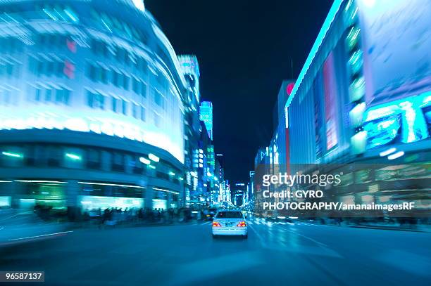 ginza at night, tokyo prefecture, honshu, japan - mitziehen stock-fotos und bilder