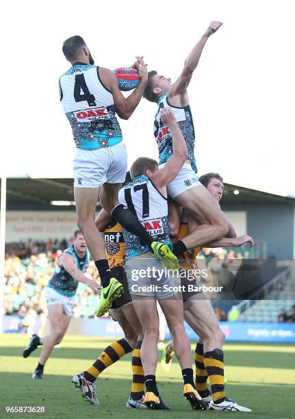 Paddy Ryder of the Power marks the ball during the round 11 AFL match between the Hawthorn Hawks and the Port Adelaide Power at University of...