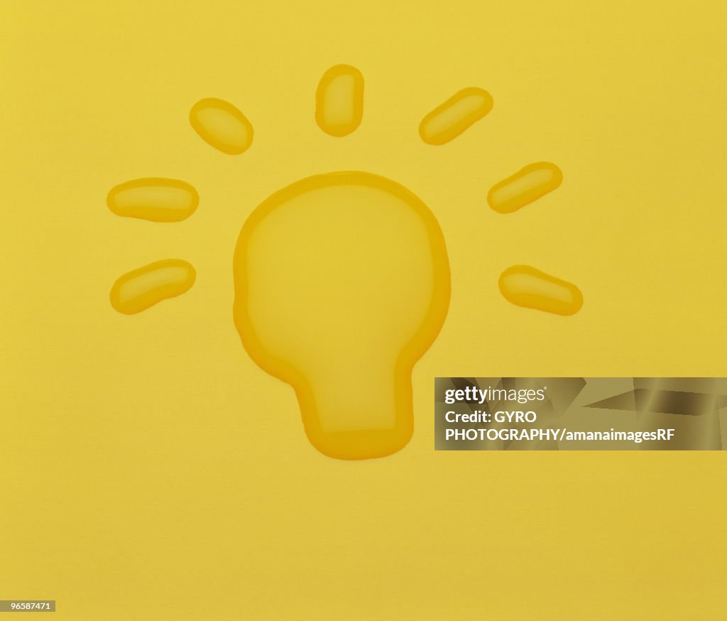 Light bulb drawn with droplets of water