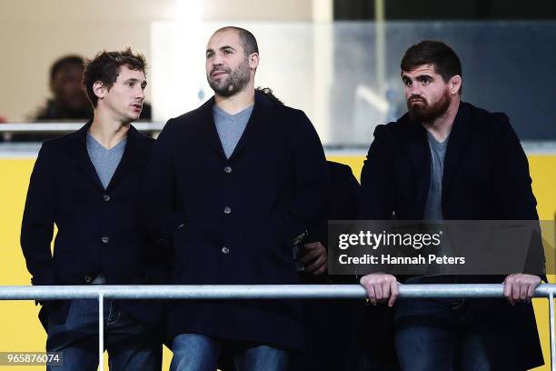 Members of the French rugby team look on during the round 16 Super Rugby match between the Blues and the Rebels at Eden Park on June 2, 2018 in...