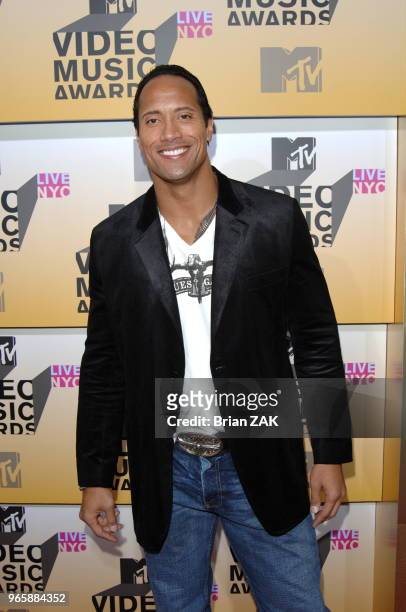 The Rock arriving to the 2006 MTV Video Music Awards at the Radio City Music Hall in New York City. Black jacket suit tshirt jeans cast smile eye...