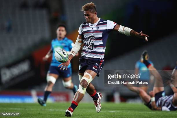 Amanaki Mafi of the Rebels kicks the ball out during the round 16 Super Rugby match between the Blues and the Rebels at Eden Park on June 2, 2018 in...