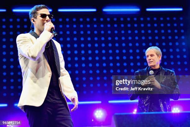 Andy Samberg and Michael Bolton perform with The Lonely Island on the Colossal Stage during Clusterfest at Civic Center Plaza and The Bill Graham...