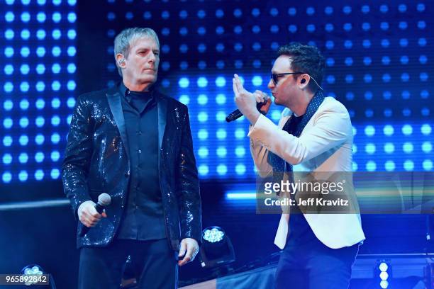 Michael Bolton performs with Akiva Schaffer of The Lonely Island on the Colossal Stage during Clusterfest at Civic Center Plaza and The Bill Graham...