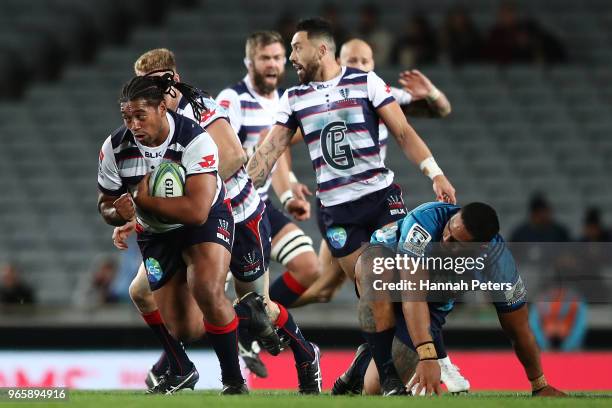 Ferret Sa'aga of the Rebels makes a break during the round 16 Super Rugby match between the Blues and the Rebels at Eden Park on June 2, 2018 in...