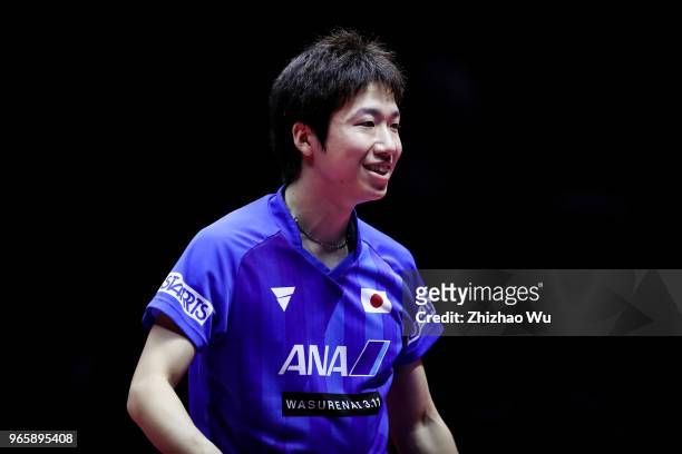 Mizutani Jun of Japan in action at the men's singles quarter-final compete with Lin Gaoyuan of China during the 2018 ITTF World Tour China Open on...