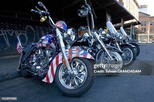 Harley-Davidson bikers gathering by Hodges and Heifers saloon in meatpackers quarter for the annual "Liberty Ride". Manhattan. City of New York....