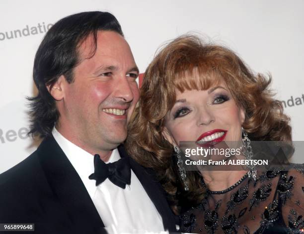New York, NY Nov 17, 2005 Joan Collins and husband at A MAGICAL EVENING by the Christopher Reeve Foundation honoring Catherine Zeta-Jones and Michael...