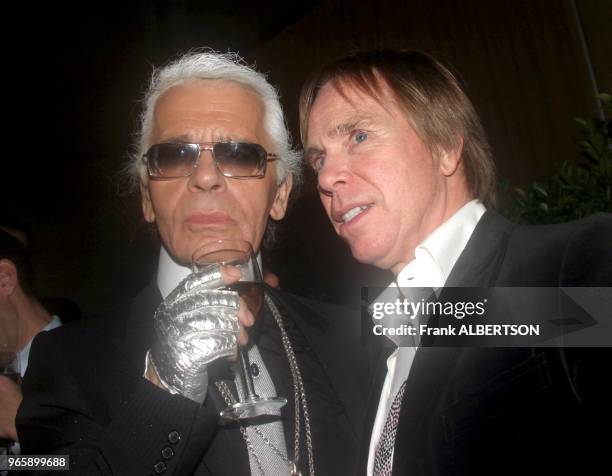 Tommy Hilfiger and Karl Lagerfeld at the Fendi 80th Anniversary All Hallow¿s Eve Party hosted by Karl Lagerfeld. October 29, 2005. Credit: Frank...