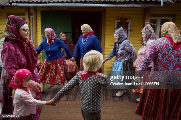 In Kihnu, women weare traditional clothes are dance together. The most visible emblem of their culture remains the woollen handicrafts worn by the...