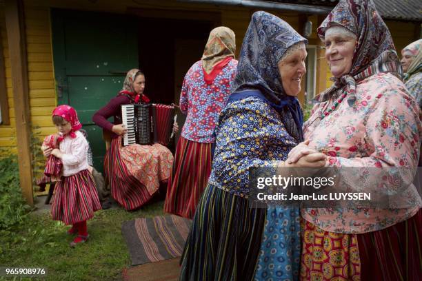 In Kihnu, women weare traditional clothes are dance together. The most visible emblem of their culture remains the woollen handicrafts worn by the...