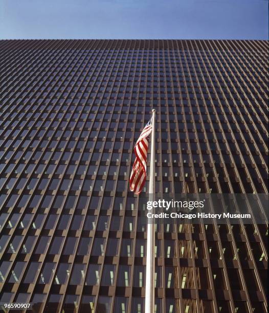 View of the Dirksen Federal Building of the Chicago Federal Center under construction and in completion, showing the soaring side of the building...