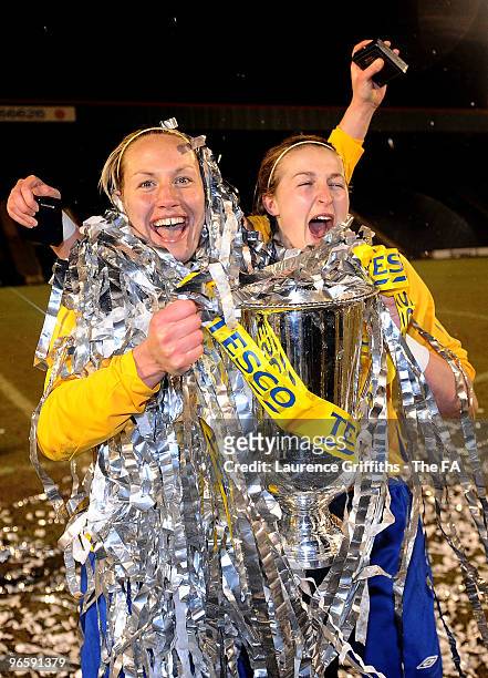 Katie Holtham and Ellen White of Leeds celebrate with the trophy during the Tesco Womens Premier League Cup Final between Everton and Leeds Carnegie...