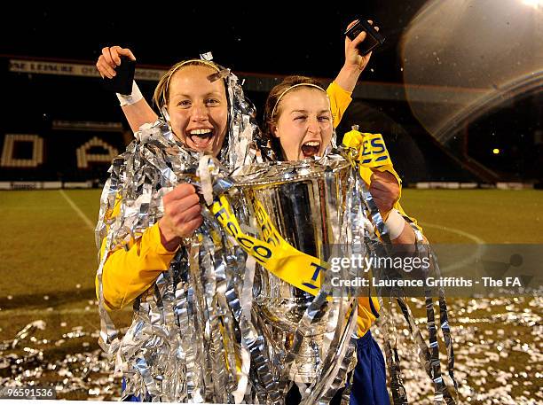 Katie Holtham and Ellen White of Leeds celebrate with the trophy during the Tesco Womens Premier League Cup Final between Everton and Leeds Carnegie...