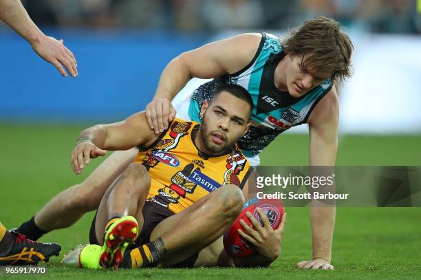 Jarman Impey of the Hawks marks the ball in the final minutes during the round 11 AFL match between the Hawthorn Hawks and the Port Adelaide Power at...