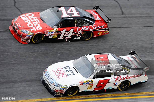 Kasey Kahne, driver of the Budweiser Ford, races Tony Stewart, driver of the Office Depot Chevrolet, during the second NASCAR Sprint Cup Series...