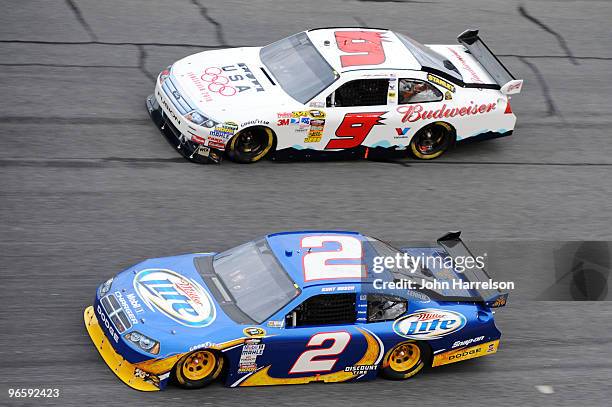 Kasey Kahne, driver of the Budweiser Ford, races Kurt Busch, driver of the#2 Miller Lite Dodge, during the second NASCAR Sprint Cup Series Gatorade...