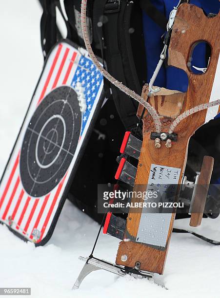 Piece of paper showing the scores next to the US team's target stands in the snow during the Biathlon men's training in Whistler Olympic Park, in...