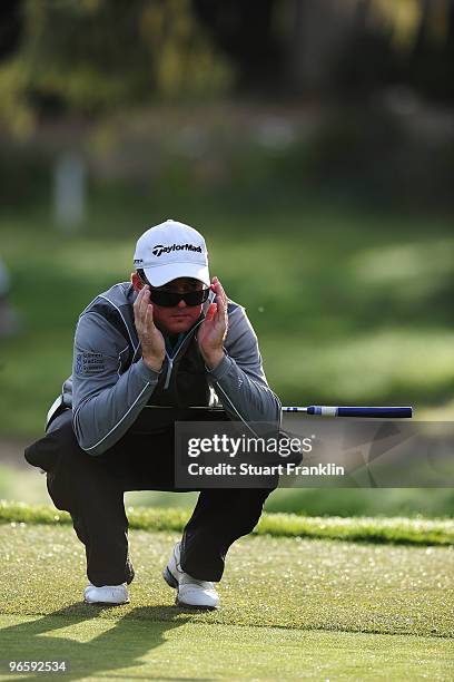 Brian Gay lines up a chat during round one of the AT&T Pebble Beach National Pro-Am at Monterey Peninsula Country Club Shore Course on February 11,...