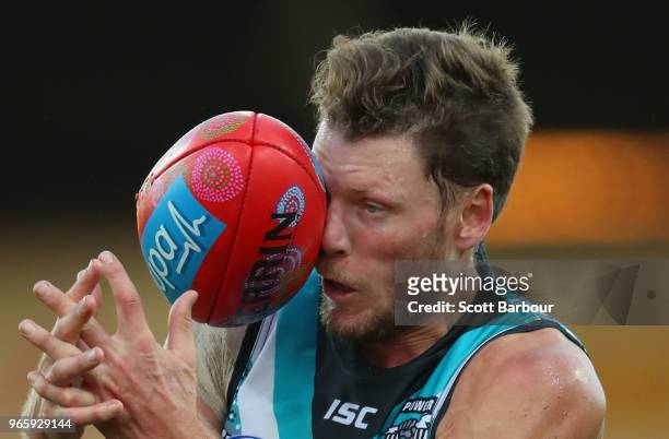 Brad Ebert of the Power attempts to mark the ball during the round 11 AFL match between the Hawthorn Hawks and the Port Adelaide Power at University...