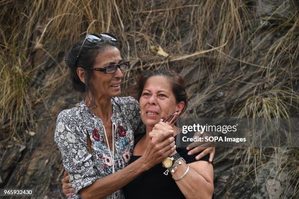 People seen crying after seeing their relatives in buses outside Helicoide Jail in Caracas. The Government of Venezuela grants precautionary measures...