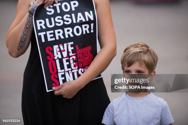 Ukranians attend a protest demanding the release of the Ukrainian filmmaker and writer,Oleg Sentsov at the Main Square in Krakow. Oleg Sentsov was...