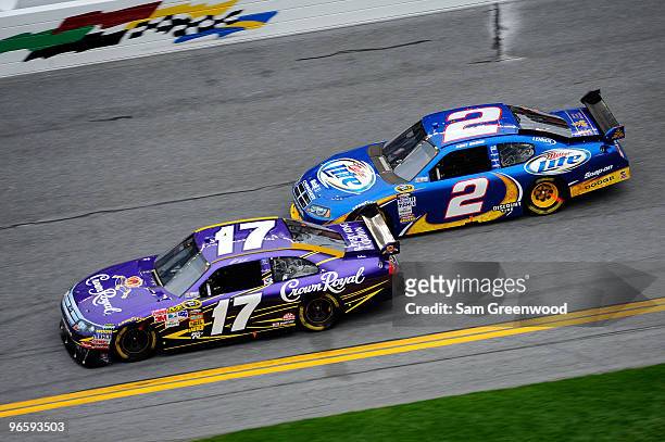 Matt Kenseth, driver of the Crown Royal Ford, leads Kurt Busch, driver of the Miller Lite Dodge, during the second NASCAR Sprint Cup Series Gatorade...