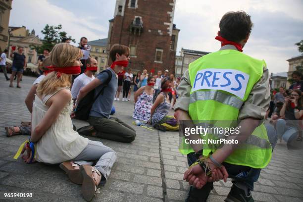 Poles and Ukrainians take part in a protest for the release of Ukrainian director Oleg Sentsov, at the Main Square in Krakow, Poland, 1 June, 2018....