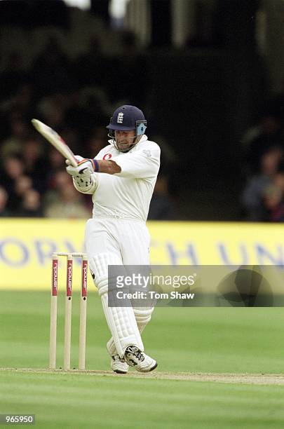 Graham Thorpe of England hits to the boundary during the First test match between England and Pakistan played at Lords Cricket Ground, in London. \...