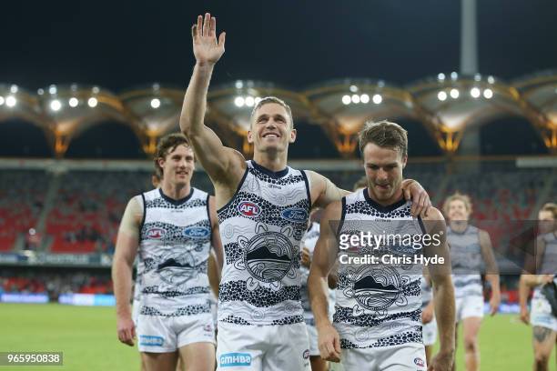 Joel Selwood and Lincoln McCarthy of the Cats celebrates winning the round 11 AFL match between the Gold Coast Suns and the Geelong Cats at Metricon...