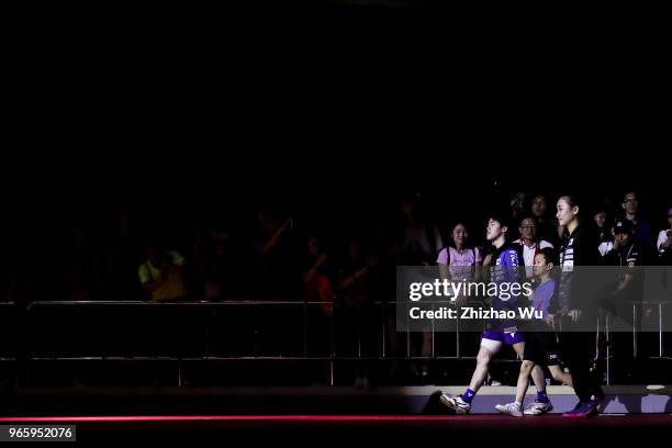 Morizono Masataka and Ito Mima of Japan in action at the mixed doubles final compete with Lin Gaoyuan and Chen Xingtong of China during the 2018 ITTF...