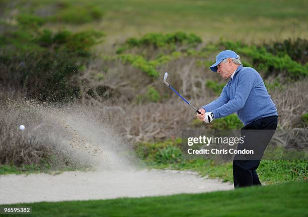 Charles Schwab hits from a bunker on during the first round of the AT&T Pebble Beach National Pro-Am at Monterey Peninsula Country Club on February...