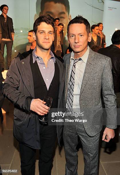 Actor Justin Bartha and editor-in-chief of GQ Jim Nelson attend the GQ's Best New Menswear Designers Party at the IAC Building on February 11, 2010...