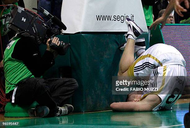 Real Madrid's Rimantas Kaukenas falls on the floor during their Top 16 Game 3, Groupe E, Euroleague basketball match against Montepaschi Siena in...