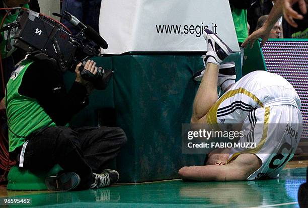 Real Madrid's Rimantas Kaukenas falls on the floor during their Top 16 Game 3, Groupe E, Euroleague basketball match against Montepaschi Siena in...