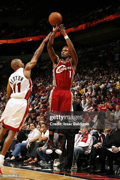 Daniel Gibson of the Cleveland Cavaliers shoots a jump shot against Rafer Alston of the Miami Heat during the game at American Airlines Arena on...