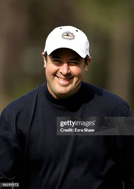 Vince Gill smiles during the first round of the AT&T Pebble Beach National Pro-Am at at the Spyglass Hill Golf Course on February 11, 2010 in Pebble...