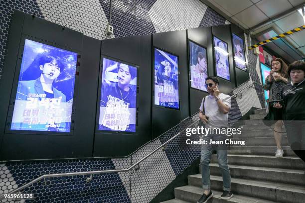 Photos of Jin from BTS are displayed at Gangnam Subway Station put up by approximately 80 fans to celebrate Jin's 5th anniversary of his debut with...