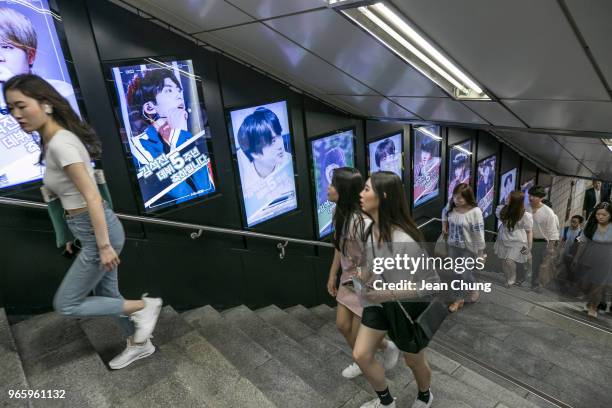 Photos of Jin from BTS are displayed at Sinchon Subway Station put up by approximately 80 fans to celebrate Jin's 5th anniversary of his debut with...