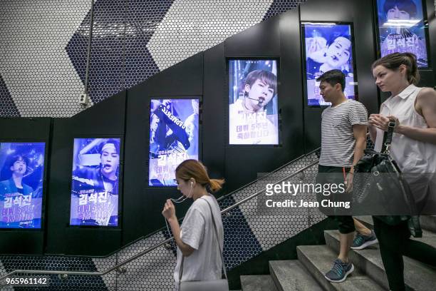 Photos of Jin from BTS are displayed at Gangnam Subway Station put up by approximately 80 fans to celebrate Jin's 5th anniversary of his debut with...