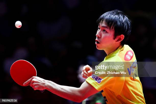 Niwa Koki of Japan in action at the men's singles quarter-final compete with Fan Zhendong of China during the 2018 ITTF World Tour China Open on June...