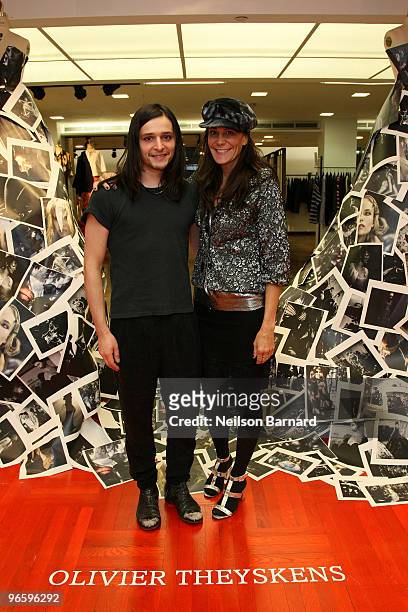 Designer Olivier Theyskens and Julie Gilhart attend Barneys New York Hosts Olivier Theyskens Book Launch during Mercedes-Benz Fashion Week at the...